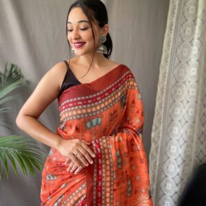 Women's Artistic Terracotta Orange Linen Saree with Kalamkari Inspired Print & Tassel Detailing – Perfect for Casual Festivities & Cultural Events